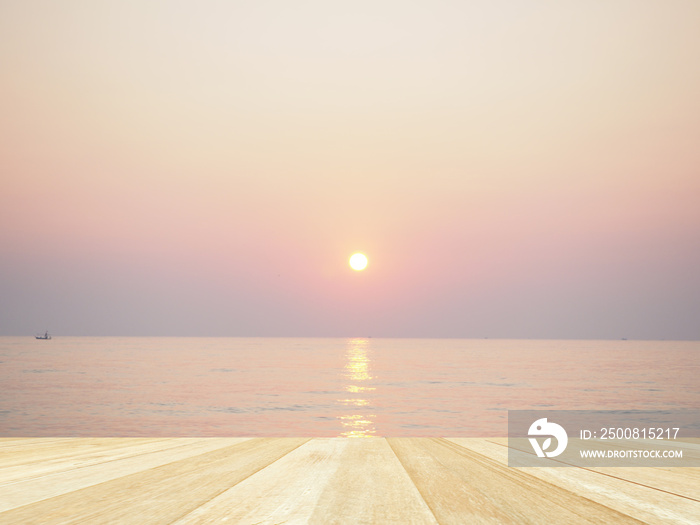 Empty top wooden table on sunset sky