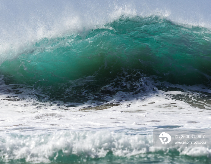 Big breaking wave at Hanakapiai beach, Kauai, Hawaii.