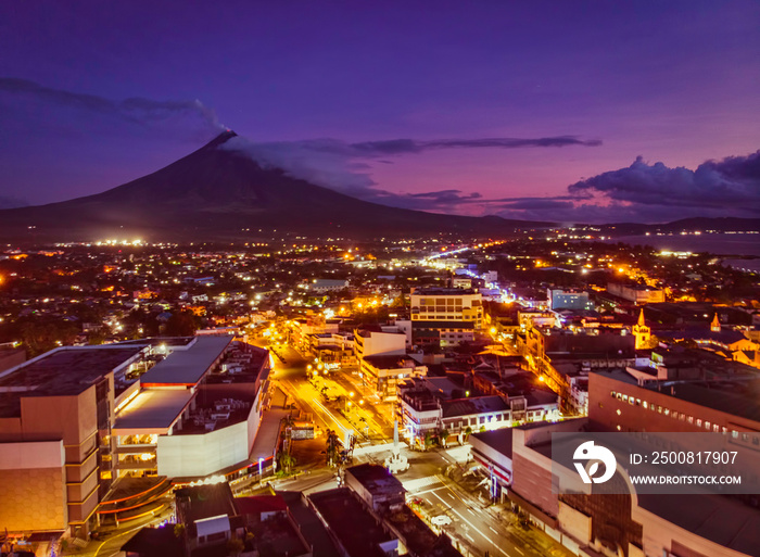 Mayon Volcano with Legazpi City lights in Legaspi City Albay Philippines