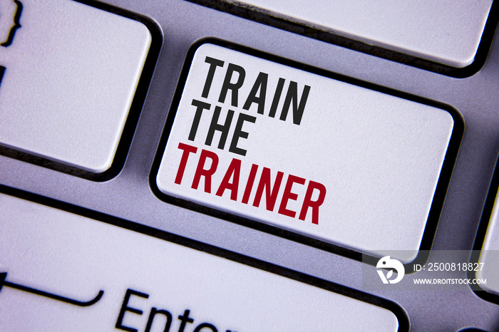 Writing note showing Train The Trainer. Business photo showcasing Learning Technique Students being teachers themselves written white keyboard key with copy space. Top view.