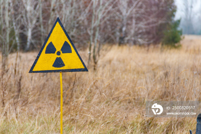 Radiation warning sign in Chernobyl Exclusion Zone in Ukraine