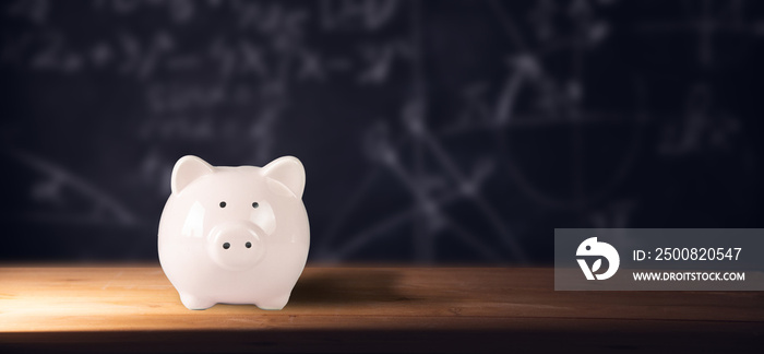 piggy bank on chalkboard background