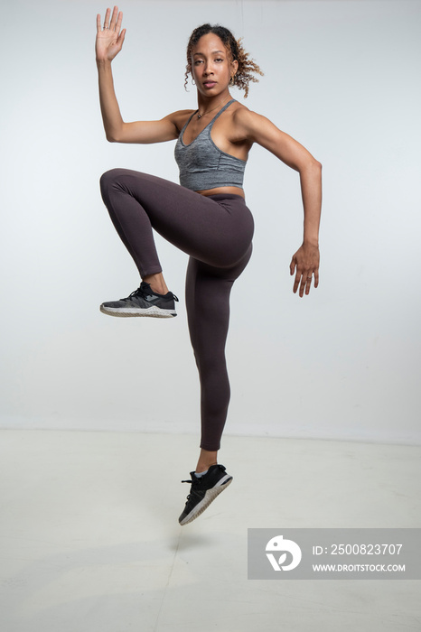 Woman jumping during training