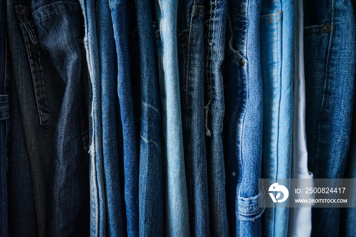 A rack of second hand jeans