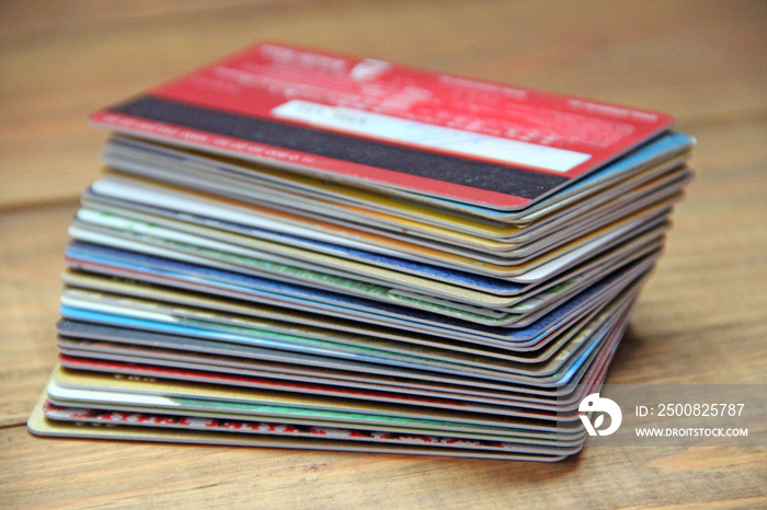 Pile of different credit cards close up