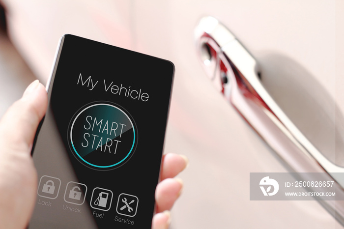 Hand showing smart start icon on smartphone.