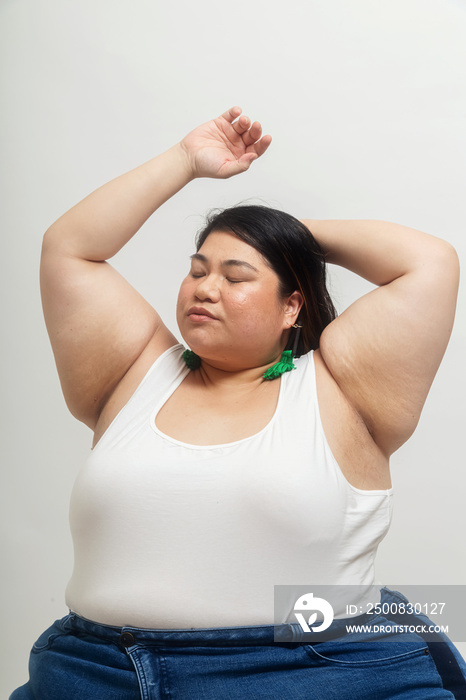 Asian plus size female solo lifestyle studio portrait shot