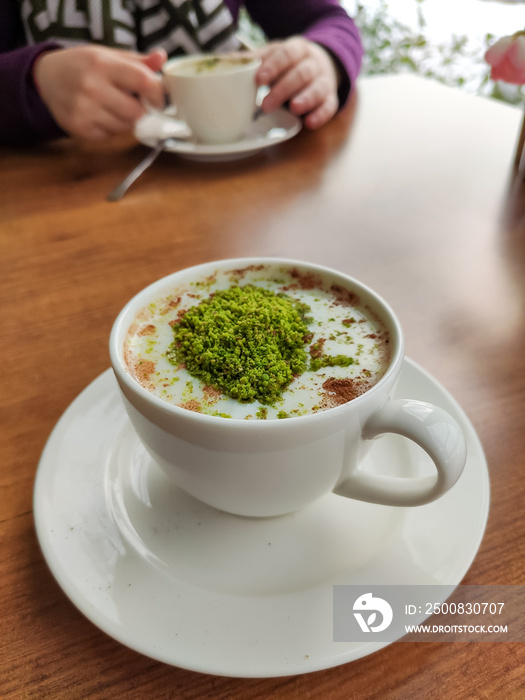 A delicious winter drink;  sahlep with ground pistachios on top