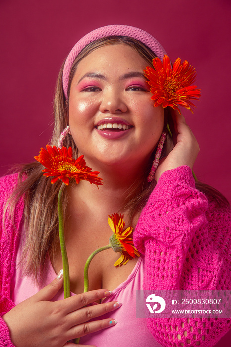 Asian individual fashion colour-blocked studio portrait