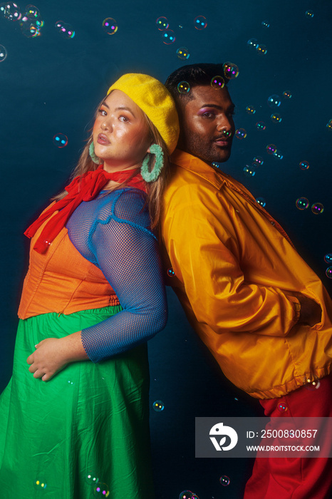 Asian duo fashion colour-blocked studio portrait