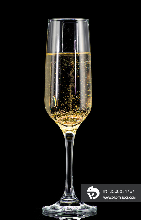 a golden ring in a glass with champagne, many bubbles, like a marriage proposal