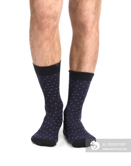 Male legs in socks on white background