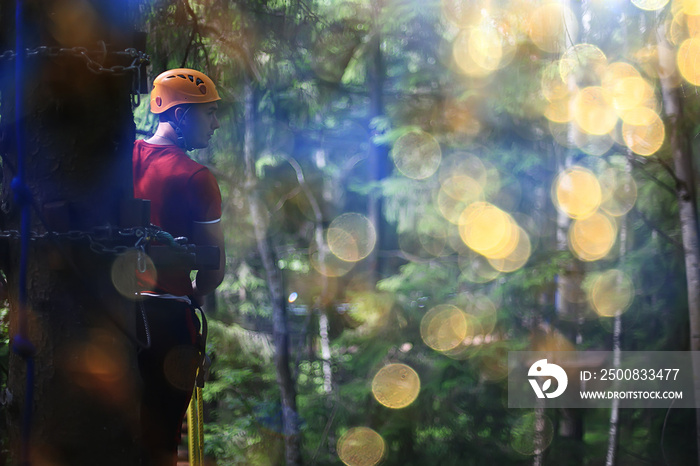 male climber rope park, outdoor activity training, guy, man extreme weekend in the forest