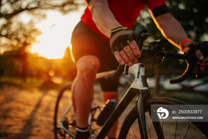 Close up of man riding bike