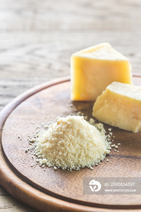 Parmesan cheese on the wooden board