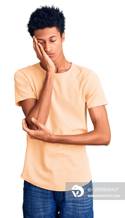 Young african american man wearing casual clothes thinking looking tired and bored with depression problems with crossed arms.