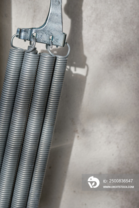 Some strong springs holding the garage door in the right place