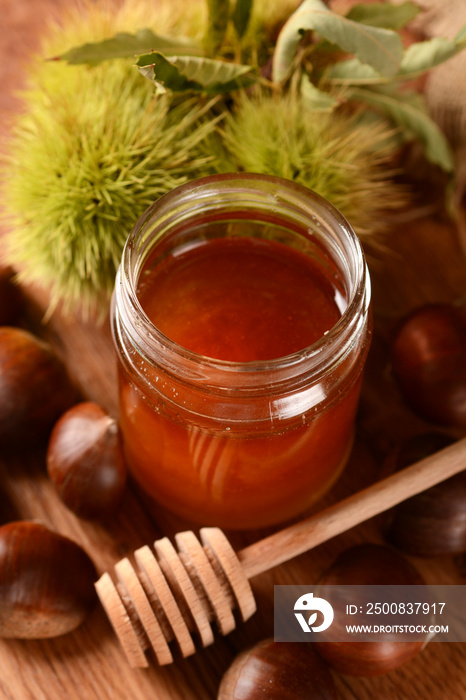 chestnuts honey in glass jar