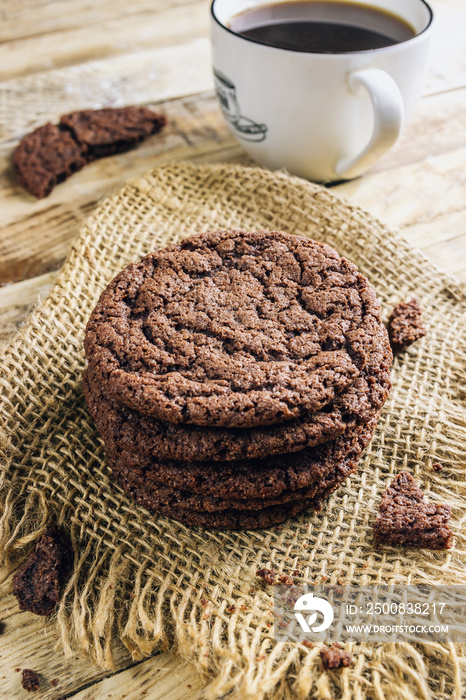 Double chocolate chip cookies on wooden table