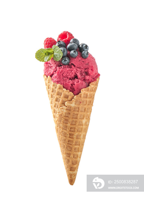 Waffle cone with delicious ice cream and berries on white background