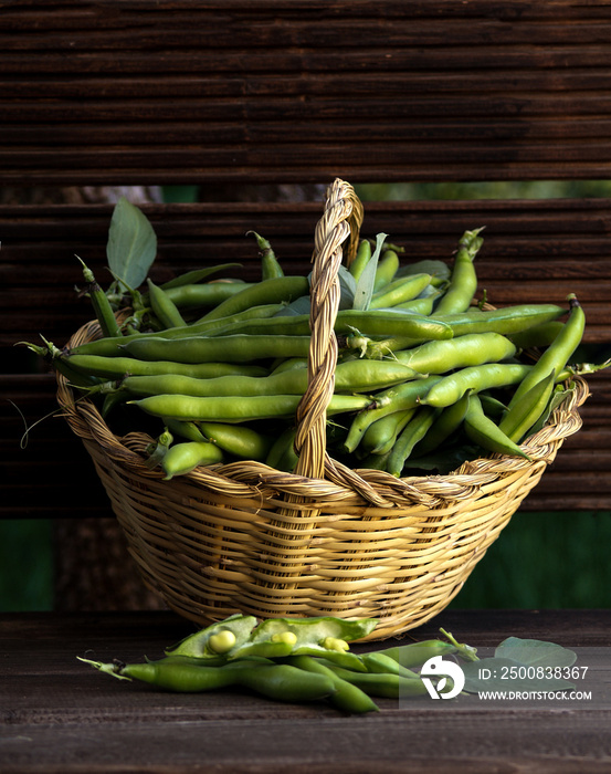 green broad beans in a basket