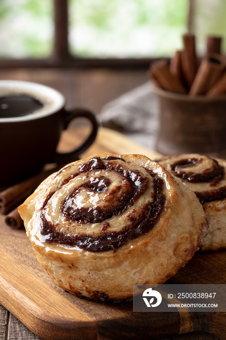 Cinnamon roll and hot coffee