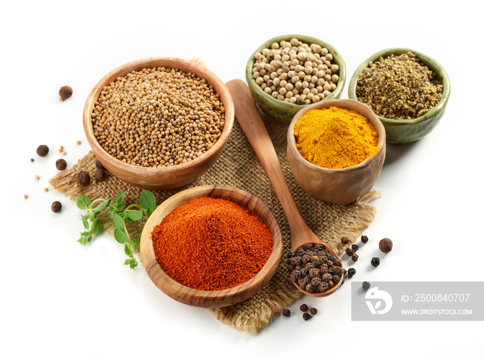 various spices on white background