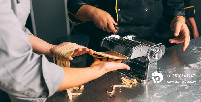 Close up photo pf pasta making process in a professional kitchen.