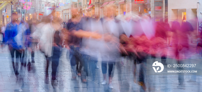 People walk at Istiklal street in Istanbul