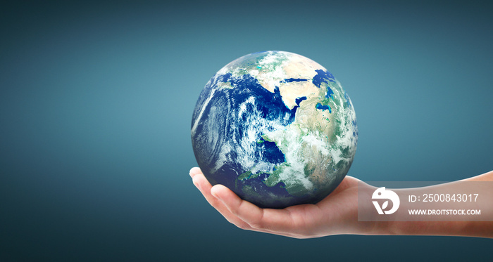 Globe ,earth in human hand, holding our planet glowing