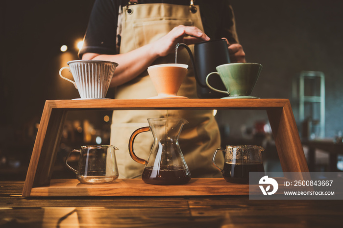 barista brewing a coffee filter drip in the morning, beverage drink with fresh black espresso aroma, hot drink in cup of cafes, brown caffeine in bar shop background