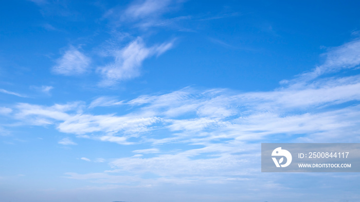 Blurred white clouds on the sky background.