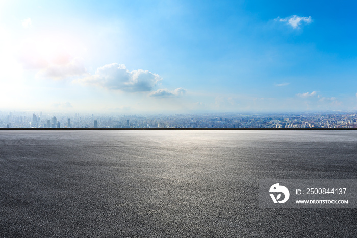 Empty asphalt road and city skyline in Shanghai,high angle view