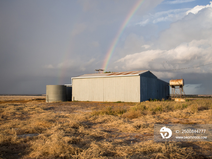 Farm shed with a rainbow, Western Australia