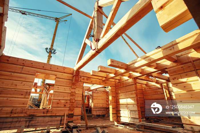 Timber building house construction log with blue sky sun light