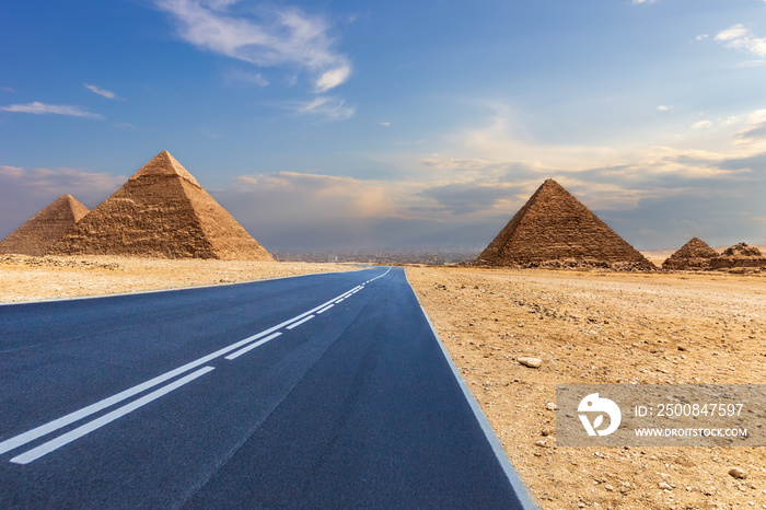 Giza Pyramids and a road in the desert, Egypt, no people