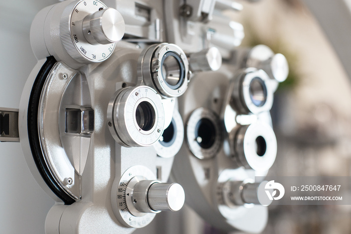 Close up of phoropter eyesight measurement testing machine, Eye health check and ophthalmology concept.