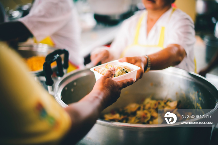 People holding a plate receiving a donation from a good friend, the concept of giving with care