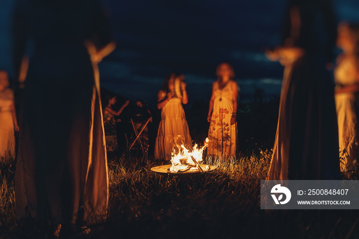 Women at the night ceremony. Ceremony space.