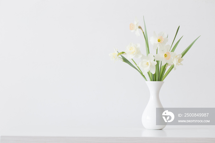 spring flowers in white vase