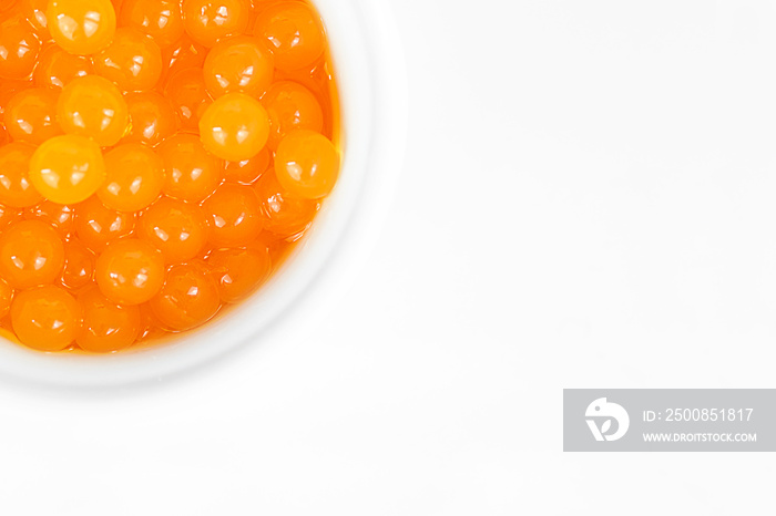 mango orange bubble tea boba pearls on light background. top view with copy space