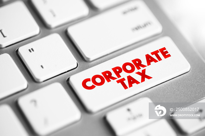 Corporate Tax - direct tax imposed on the income or capital of corporations or analogous legal entities, text concept button on keyboard