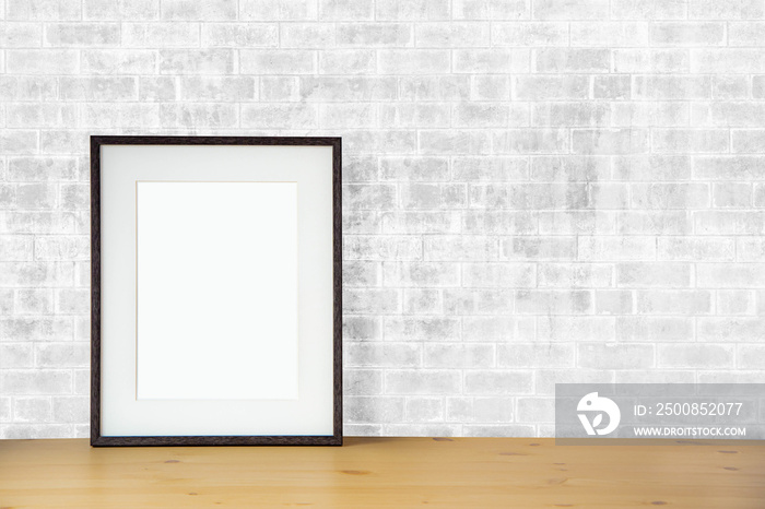 blank picture frame on the white brick wall and the wooden floor, template poster interior photo 3d background