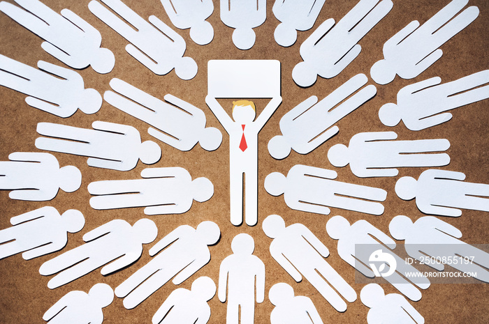 Paper people. A symbolic image of Trump holding a blank poster, surrounded by his supporters.Copy space. The concept of protest against the election results, and the illegal call to storm the Capitol.