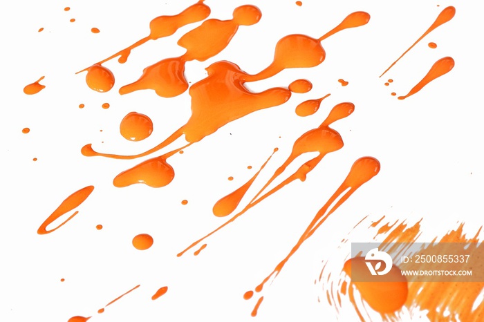 Orange paint splashes on the white background. Abstract 3d background made from paint.