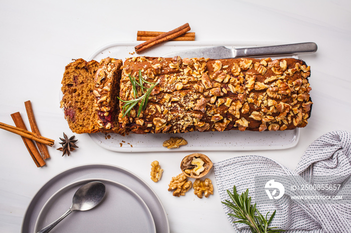 Vegan berries and nuts bread. Plant based dessert on white background. Healthy vegan food concept.