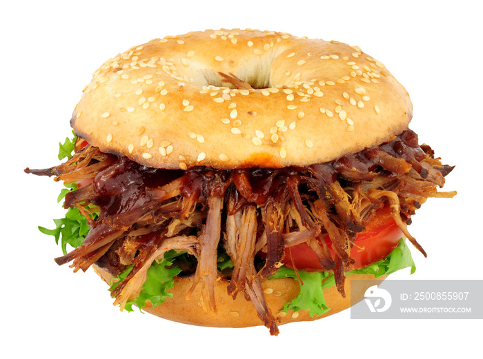 Slow cooked shredded beef and salad filled bagel sandwich isolated on a white background