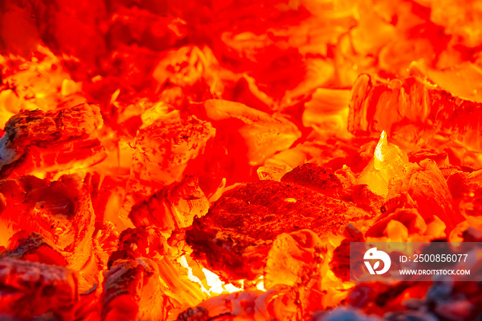 red hot coals in a blast furnace for metal melting. metal mining and processing industry. Red coals from a burnt fire made of wood