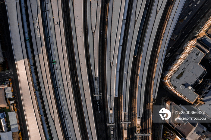 Aerial view of the London Bridge station from above with trains leaving the station.