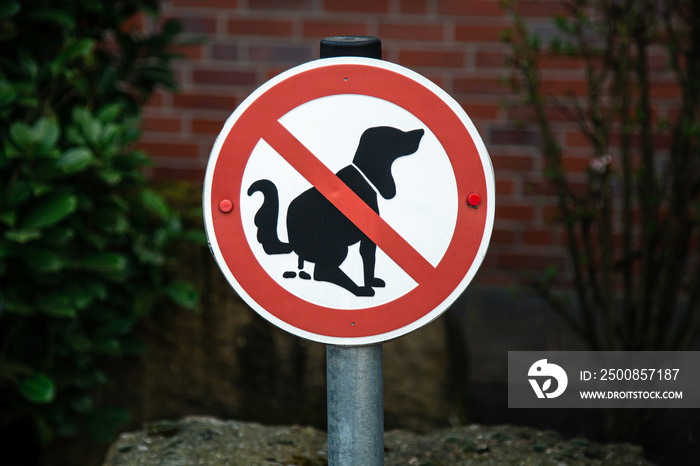 A sign no dog poop . Concept cleaning up dog droppings.